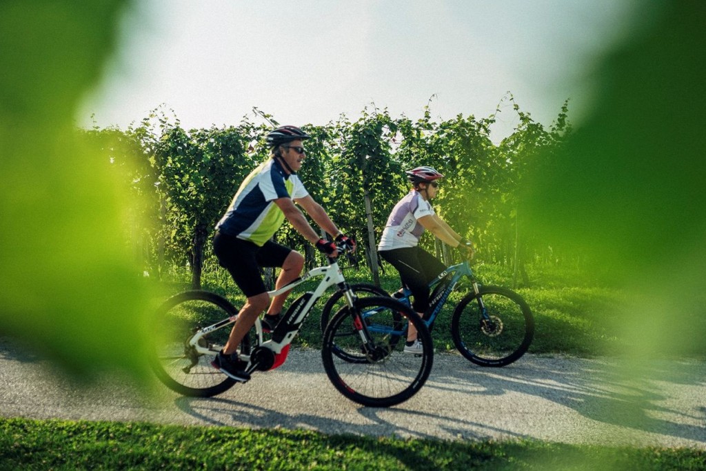 Couple cycling in Slovenia