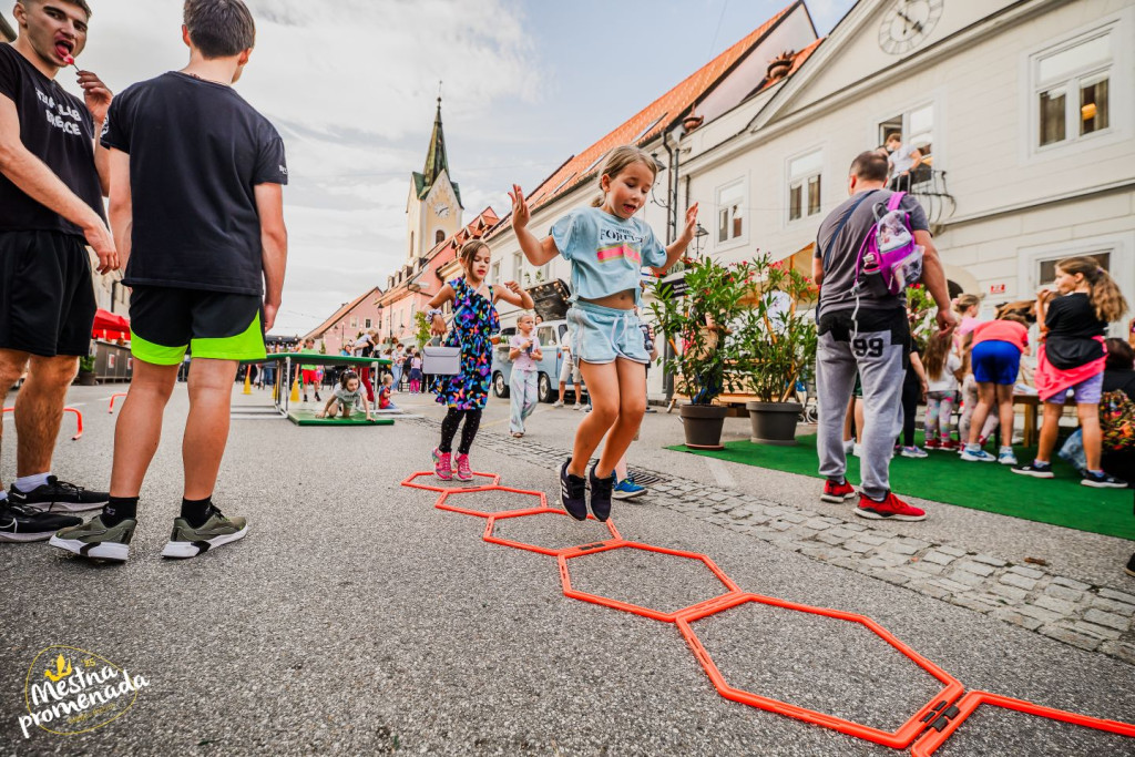 Children playing at the City promenade event in Brežice
