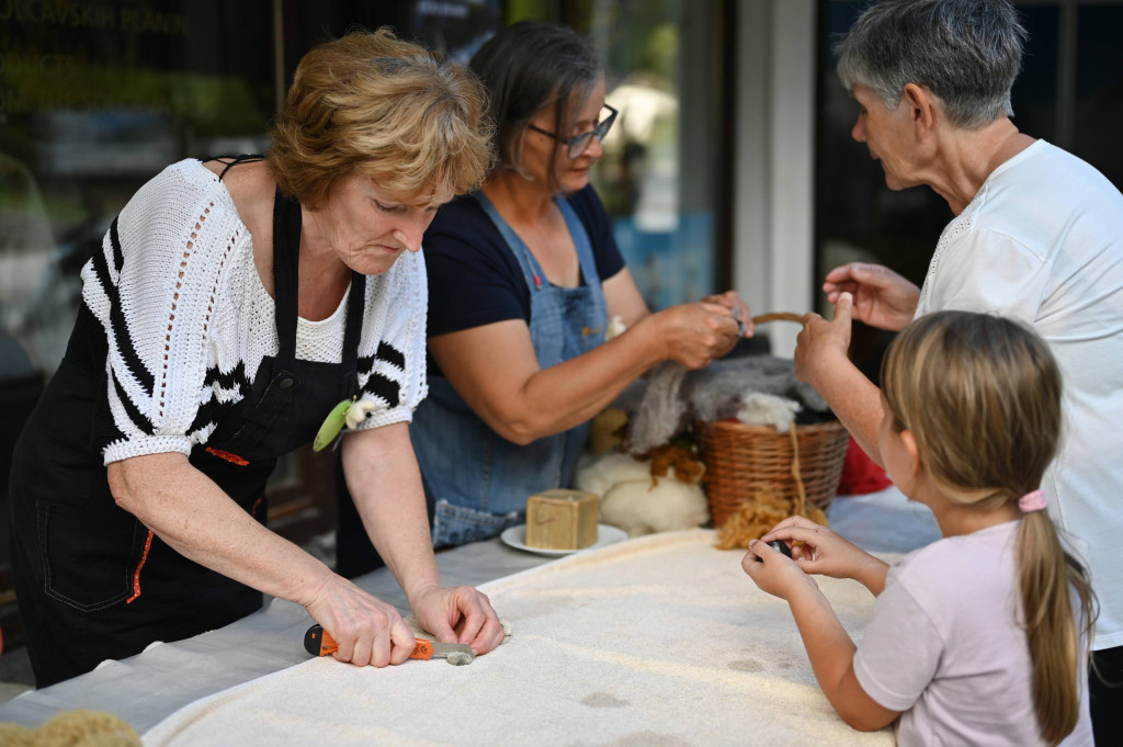 Women hand crafting at Solčava Days