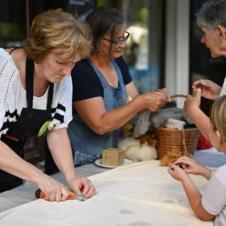 Women hand crafting at Solčava Days