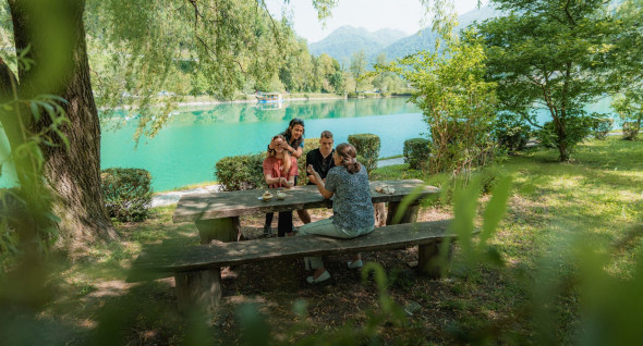 Four people on the historic guided walk through the Soča Valley