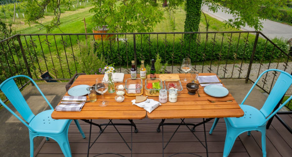 A breakfast featuring local products served on a terrace overlooking the vineyards of Jeruzalem Slovenija.