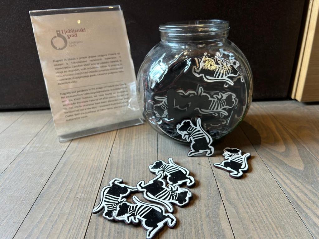 Upcycled souvenirs made from red carpet felt at Ljubljana Castle, including magnets created in collaboration with KNOF.